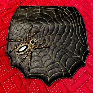Magnolia and Vine individual spider handbag flap